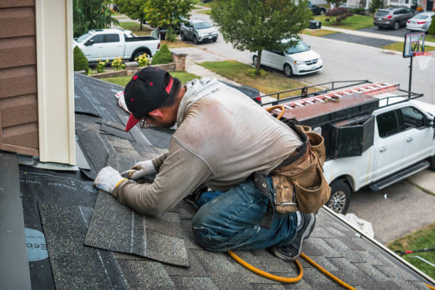Professional Roofing technician working in Wadesville, IN